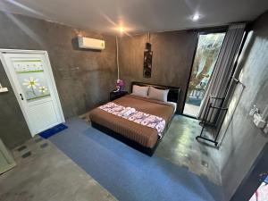 Postelja oz. postelje v sobi nastanitve Judy Park Resort Buriram