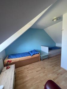 Postel nebo postele na pokoji v ubytování Mariengestüt am Kreuzberg
