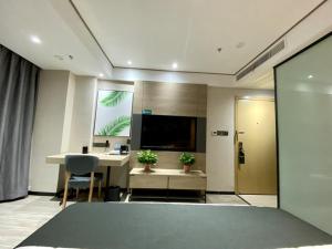 TV a/nebo společenská místnost v ubytování Thank Inn Plus Suqian Shuyang Shandong Mall