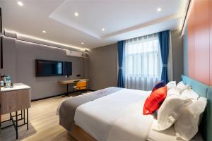 Φωτογραφία από το άλμπουμ του Junyi Hotel Wuhan Liuduqiao Subway Station στο Γουχάν