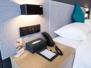 Letto o letti in una camera di Thank Inn Plus Datong Senyuan Building High-Speed Railway Station