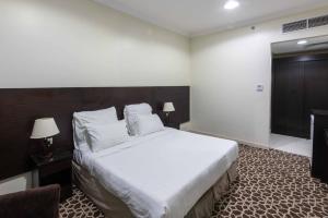 Postel nebo postele na pokoji v ubytování Abdul Hafez Al Humaidan Hotel