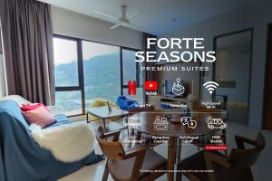a dining room with a table and chairs and a window at Forte Seasons Genting Geo38 in Genting Highlands