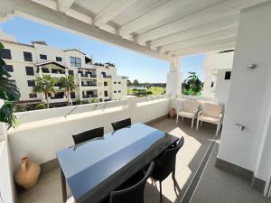 Balkón nebo terasa v ubytování PUSHE Playa Granada Beach&Golf 3