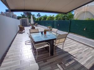 A balcony or terrace at La Perla Azul - Terraza panorámica al Sol