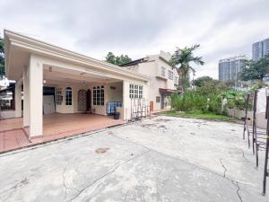 an empty driveway in front of a house at HUKM CoLiving 1 by Manhattan Group in Kuala Lumpur