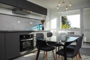 Η κουζίνα ή μικρή κουζίνα στο Appartement moderne 2 chambres