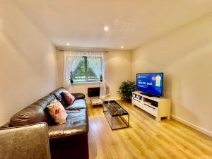 Khu vực ghế ngồi tại Cosy apartment in West London