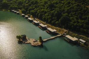 an aerial view of a dock on a lake at Apart Hotel Kundzuli in Kvareli