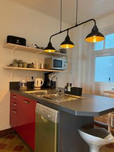 Кухня или мини-кухня в BRINC-JOLI DUPLEX
