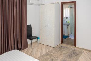 Postel nebo postele na pokoji v ubytování Occidental Wise Transit Hotel