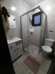 Koupelna v ubytování Casa da Cris/Marcelo + 25 fotografií