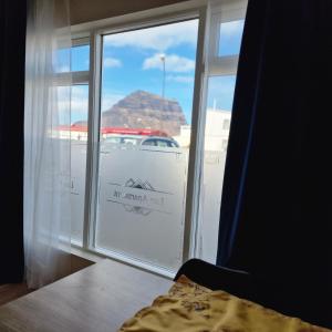 Ένα ή περισσότερα κρεβάτια σε δωμάτιο στο Olga Apartments