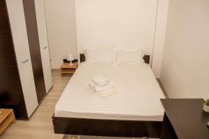 Postel nebo postele na pokoji v ubytování Occidental Wise Transit Hotel