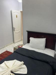 Letto o letti in una camera di Ahmose Pyramids view inn