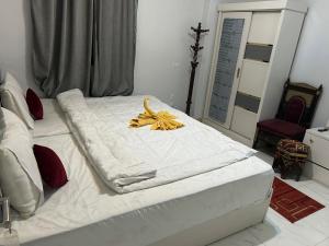 Letto o letti in una camera di Ahmose Pyramids view inn