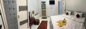 Letto o letti in una camera di Ahmose Pyramids view inn
