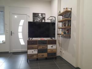 Televisyen dan/atau pusat hiburan di Le gîte lorette