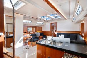 a kitchen and living room on a yacht at Sailboat Hanse 455 in Positano