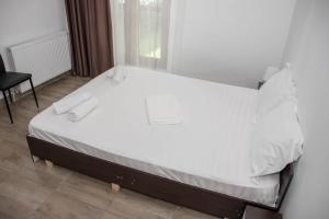 Postel nebo postele na pokoji v ubytování Occidental Wise Transit Hotel