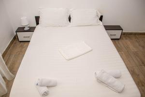 Postel nebo postele na pokoji v ubytování Occidental Wise Transit Hotel