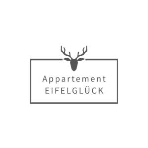 Wellness Appartement Eifelglück في Pelm: صورة شعار الشقة المحرر