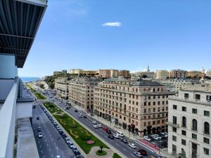 an aerial view of a city street with cars at Attico36 con parcheggio e vista mozzafiato in Genova