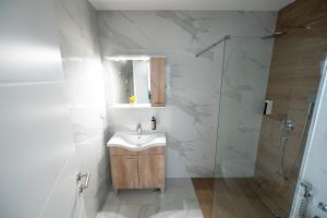 Koupelna v ubytování Hotel MM Residence + 37 fotografií