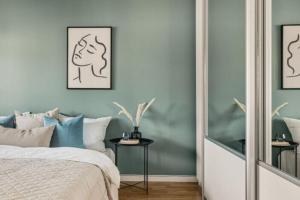 Fully equipped and bright apartment in Paradis tesisinde bir odada yatak veya yataklar
