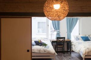 Voodi või voodid majutusasutuse Snow House Hotel toas