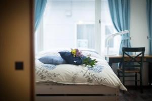 Voodi või voodid majutusasutuse Snow House Hotel toas