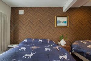 Voodi või voodid majutusasutuse Snow House Hotel toas