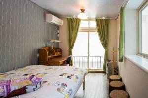 Voodi või voodid majutusasutuse Snow House Hotel toas