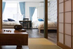 Voodi või voodid majutusasutuse Snow House Hotel toas