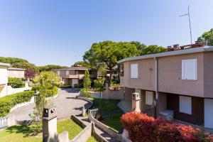 arial view of a building with a yard at Tivoli in Bibione