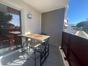 En balkon eller terrasse på Studio Tennis et Padel