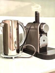 a coffee maker and a toaster sitting on a counter at Stephansdom apartment in Vienna