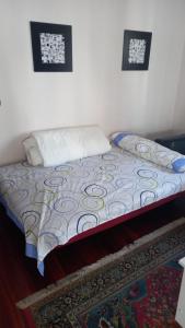 Een bed of bedden in een kamer bij Peñazcal casita feliz