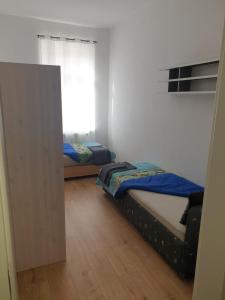 Posteľ alebo postele v izbe v ubytovaní Ferien Wohnungen