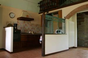 A kitchen or kitchenette at Il Nido - Private villa with pool and jacuzzi