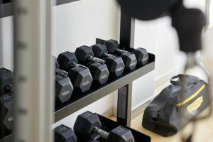 a black keyboard on a shelf with a bag at Hotel Scalinatella in Capri