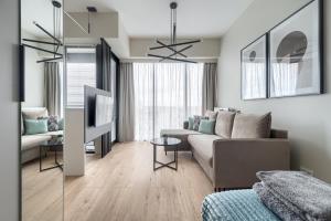 Ένα ή περισσότερα κρεβάτια σε δωμάτιο στο MARGI Smart Apartament HANZA POOL SAUNA +12 φωτογραφίες