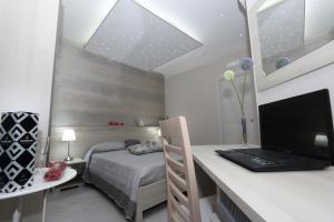 Кровать или кровати в номере Le Suite Di Via Veneto
