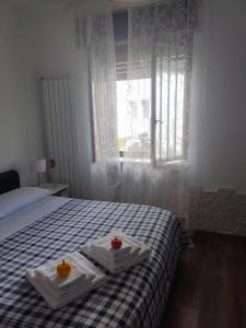 A bed or beds in a room at B&B A casa di Carla