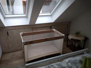 Postel nebo postele na pokoji v ubytování Kisfaludy Sándor Apartman
