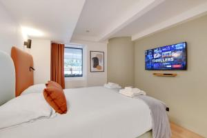Łóżko lub łóżka w pokoju w obiekcie Incroyable appartement - 3BR-8P - Pl de la Nation