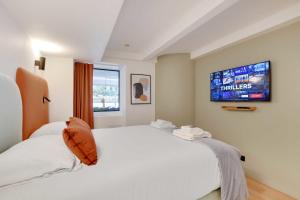 Łóżko lub łóżka w pokoju w obiekcie Incroyable appartement - 3BR-8P - Pl de la Nation