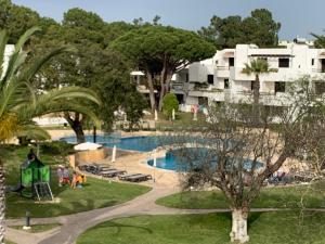 a view of the pool at a resort at Piece of Paradise @ Balaia Golf Village, Albufeira, PORTUGAL - 4 STAR in Albufeira