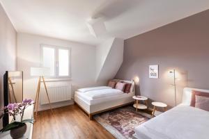 Postel nebo postele na pokoji v ubytování PRIMERA Zimmer mit Gemeinschaftsbad