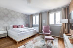 Postel nebo postele na pokoji v ubytování PRIMERA Zimmer mit Gemeinschaftsbad